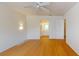 Spacious bedroom with hardwood floors and ensuite bathroom at 1237 N Mcmullen Booth Rd # 1237, Clearwater, FL 33759