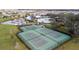 Aerial view showing tennis and basketball courts in a community at 13355 Orca Sound Dr, Riverview, FL 33579