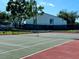 Well-maintained tennis court, perfect for recreation at 1344 Pine Ridge E Cir # D2, Tarpon Springs, FL 34688