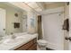 Clean bathroom with a shower/tub combo and a vanity with a sink at 14315 Arbor Hills Rd, Tampa, FL 33625