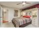 Comfortable bedroom with ample closet space and a ceiling fan at 14315 Arbor Hills Rd, Tampa, FL 33625