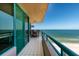 Balcony features oceanfront views and comfortable seating at 1520 Gulf Blvd # 1404, Clearwater Beach, FL 33767