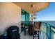 Outdoor balcony with table and chairs, ocean view at 1520 Gulf Blvd # 1404, Clearwater Beach, FL 33767