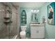 Updated bathroom with a walk-in shower, granite vanity, and stylish decor at 1520 Gulf Blvd # 1404, Clearwater Beach, FL 33767