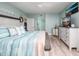 King bedroom with calming decor and ocean view at 1520 Gulf Blvd # 1404, Clearwater Beach, FL 33767