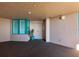 Private condo entry with a door, window, and potted plant at 1520 Gulf Blvd # 1404, Clearwater Beach, FL 33767