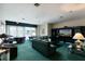 Spacious recreation room with comfortable seating and large screen TV at 1520 Gulf Blvd # 1404, Clearwater Beach, FL 33767