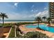 Relaxing pool area with ocean views at 1520 Gulf Blvd # 1404, Clearwater Beach, FL 33767