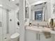 Clean bathroom, features a walk-in shower and modern vanity at 1660 Gulf Blvd # Ph1, Clearwater Beach, FL 33767