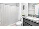 Bathroom with shower and granite vanity at 17033 Oval Rum Dr, Wimauma, FL 33598