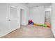 Bright playroom with toys and built-in storage at 17033 Oval Rum Dr, Wimauma, FL 33598