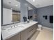 Modern bathroom with double vanity and soaking tub at 175 1St S St # 3102, St Petersburg, FL 33701