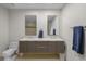 Double vanity bathroom with modern fixtures at 175 1St S St # 3102, St Petersburg, FL 33701