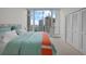 Bright bedroom with city view and teal bedding at 175 1St S St # 3102, St Petersburg, FL 33701