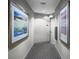 Bright hallway with neutral walls and modern artwork at 175 1St S St # 3102, St Petersburg, FL 33701