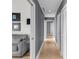 Light-filled hallway with gray walls and wood flooring at 175 1St S St # 3102, St Petersburg, FL 33701