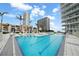 Resort-style pool with lounge chairs and city views at 175 1St S St # 3102, St Petersburg, FL 33701