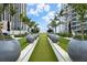 Landscaped putting green with palm trees and ocean views at 175 1St S St # 3102, St Petersburg, FL 33701