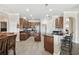 Modern kitchen with dark wood cabinets and granite counters at 18442 New London Ave, Land O Lakes, FL 34638