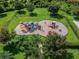 Aerial view of a playground with slides and climbing structures at 18442 New London Ave, Land O Lakes, FL 34638