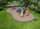 Community playground with playset and basketball court at 18442 New London Ave, Land O Lakes, FL 34638