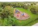 Aerial view of a playground with slides and climbing structures at 18442 New London Ave, Land O Lakes, FL 34638