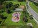 Community playground with playset and basketball court at 18442 New London Ave, Land O Lakes, FL 34638