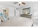 Large bedroom with a king-size bed and en-suite bathroom at 19727 Gulf Blvd # 103, Indian Shores, FL 33785