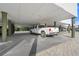 Covered parking space under building; one vehicle at 19727 Gulf Blvd # 103, Indian Shores, FL 33785