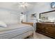 Light and airy bedroom with tiled floors and ample closet space at 204 Sky Loch W Dr, Dunedin, FL 34698