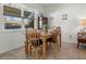 Cozy dining area with wooden table and chairs at 204 Sky Loch W Dr, Dunedin, FL 34698