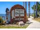 Welcome to Dunedin sign featuring a bagpiper statue at 204 Sky Loch W Dr, Dunedin, FL 34698