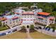 Aerial view of Fenway Hotel, showcasing its architecture and landscaping at 204 Sky Loch W Dr, Dunedin, FL 34698