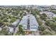 Aerial view of new townhouses with surrounding neighborhood and city skyline in background at 2109 1St N Ave, St Petersburg, FL 33713