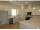 Modern kitchen with white cabinets and quartz countertops at 2109 1St N Ave, St Petersburg, FL 33713