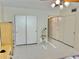 Spacious bedroom with mirrored closet doors at 2222 Americus N Blvd # 2, Clearwater, FL 33763