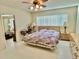 Bright bedroom with a view and dresser at 2222 Americus N Blvd # 2, Clearwater, FL 33763