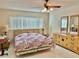 Spacious bedroom with large window and ample closet space at 2222 Americus N Blvd # 2, Clearwater, FL 33763