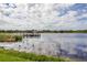 Serene lake view with a wooden dock at 2222 Americus N Blvd # 2, Clearwater, FL 33763