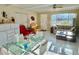 Open living area with kitchen, dining and seating areas at 2222 Americus N Blvd # 2, Clearwater, FL 33763