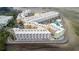 Aerial view of waterfront condo building and surrounding area at 2506 N Rocky Point Dr # 272, Tampa, FL 33607