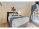 Bedroom with a queen bed, nightstand and mirrored closet at 2506 N Rocky Point Dr # 272, Tampa, FL 33607