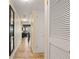 Condo hallway with tile floors and doors to bedrooms and living areas at 2506 N Rocky Point Dr # 272, Tampa, FL 33607