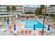 Inviting pool area with lounge chairs and umbrellas at 2506 N Rocky Point Dr # 272, Tampa, FL 33607