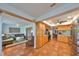 Open kitchen with views into the living and dining areas, featuring ample cabinetry at 2510 Lambdin Dr, Sun City Center, FL 33573