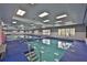 Indoor lap pool with separate shallow area for recreation at 2510 Lambdin Dr, Sun City Center, FL 33573