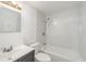 Clean bathroom with a shower/tub combo and gray vanity at 281 Grove Rd, Venice, FL 34293