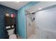 Small bathroom with a toilet and shower at 3079 Landmark Blvd # 1606, Palm Harbor, FL 34684