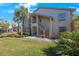 Condo with stairs leading to the entrance at 3079 Landmark Blvd # 1606, Palm Harbor, FL 34684