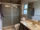 Clean bathroom with shower, toilet and vanity at 3544 Snowy Egret Ct, Palm Harbor, FL 34683